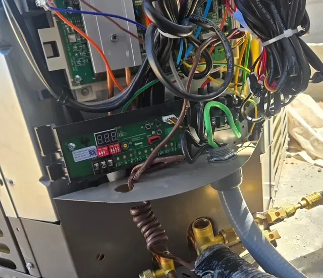 Control board and wiring inside a commercial package unit