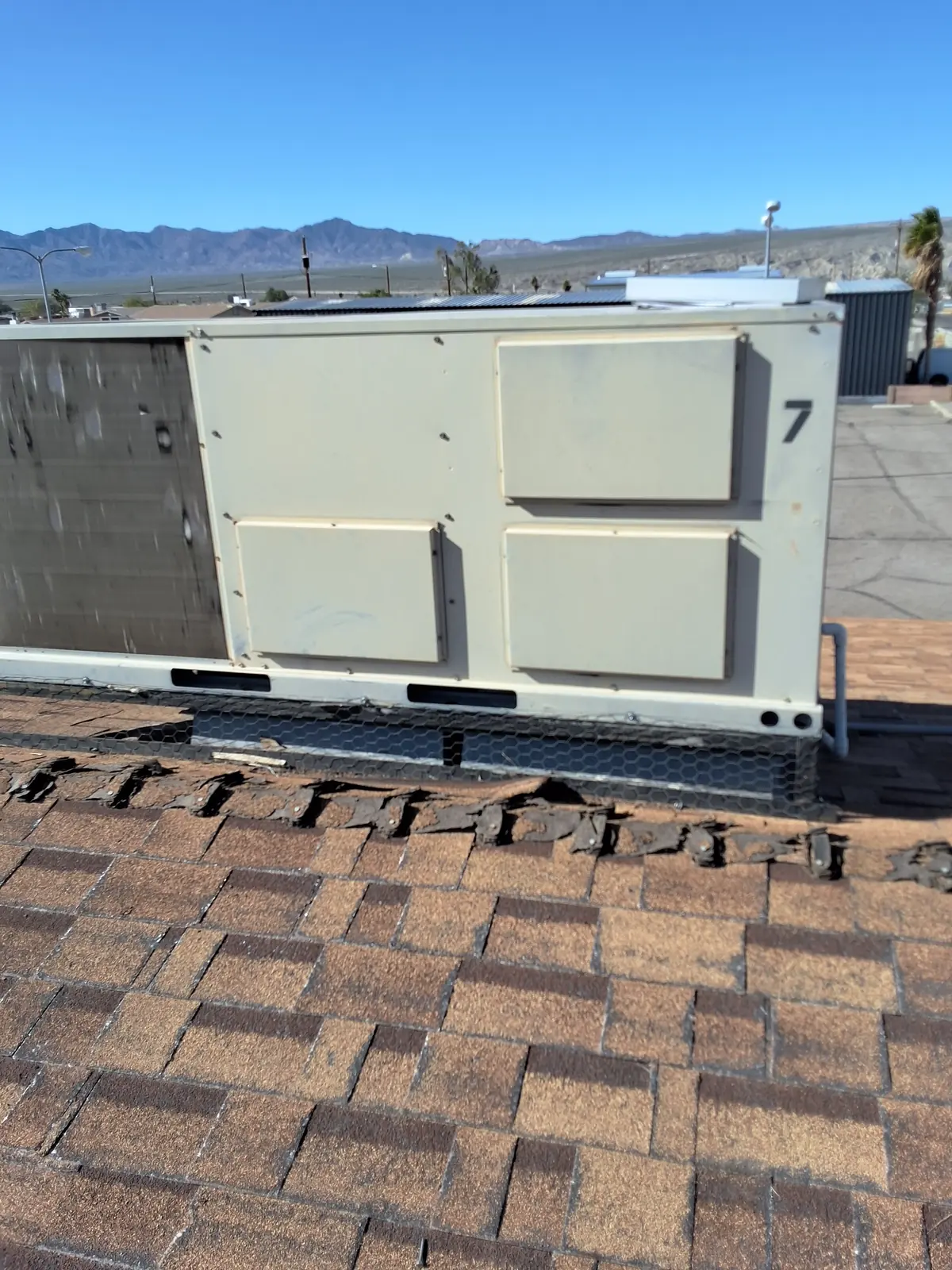 Rooftop package unit with mountains in the background