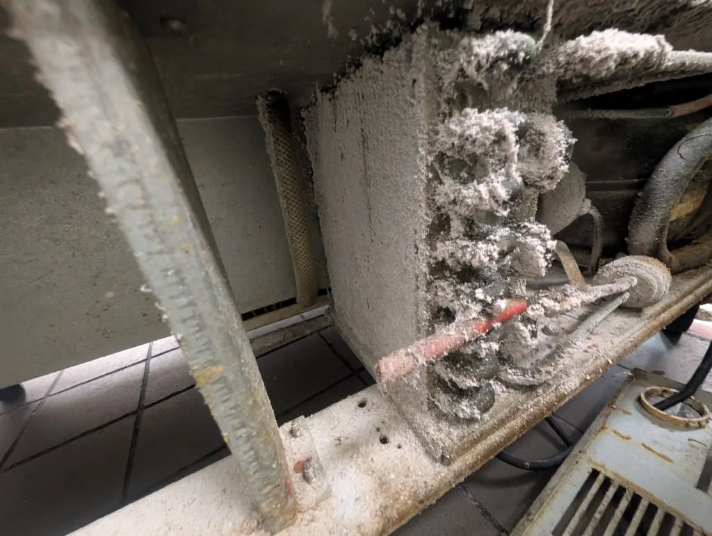 Dirty evaporator coil inside an indoor unit