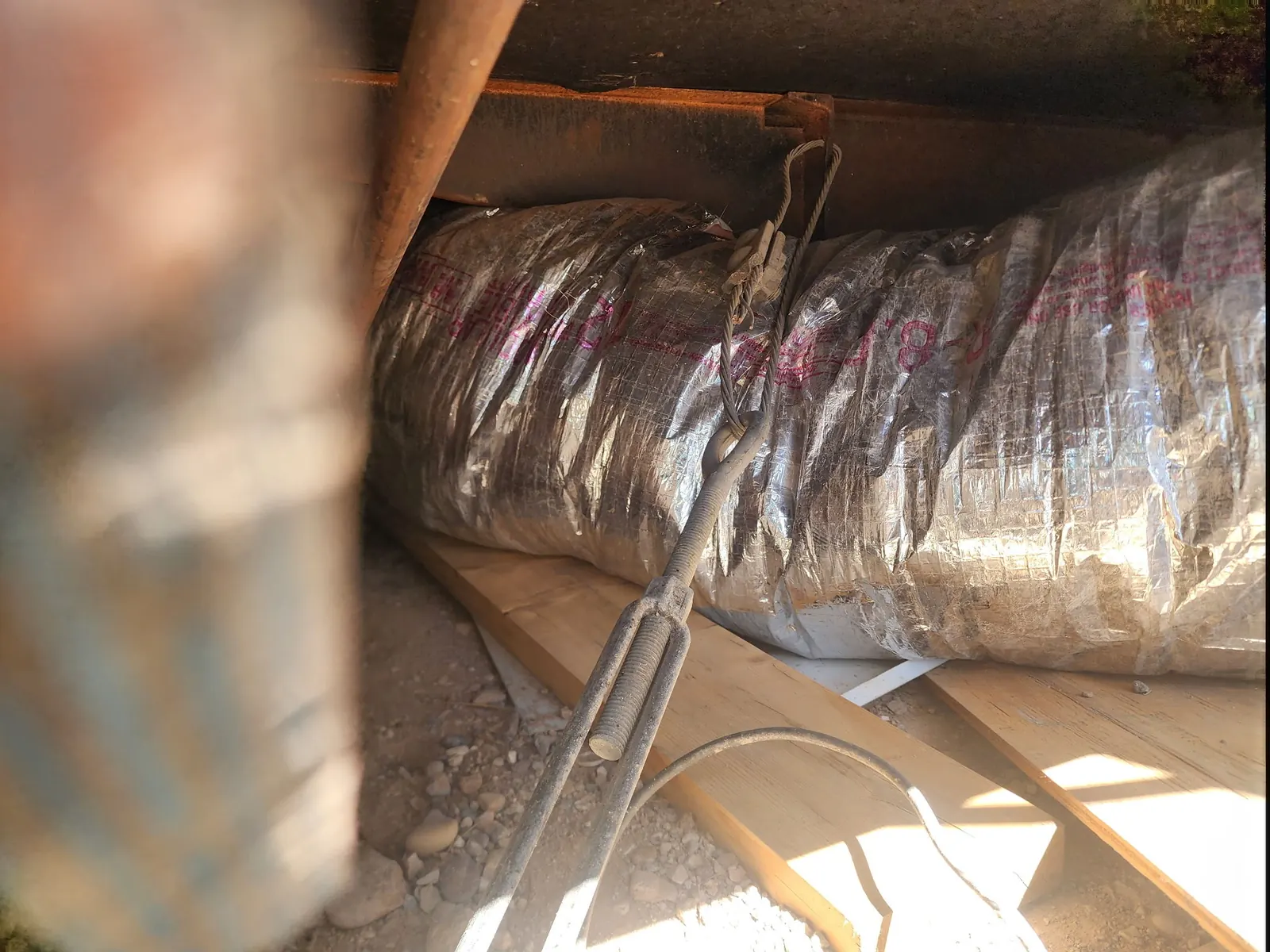 Flexible duct runs in an attic