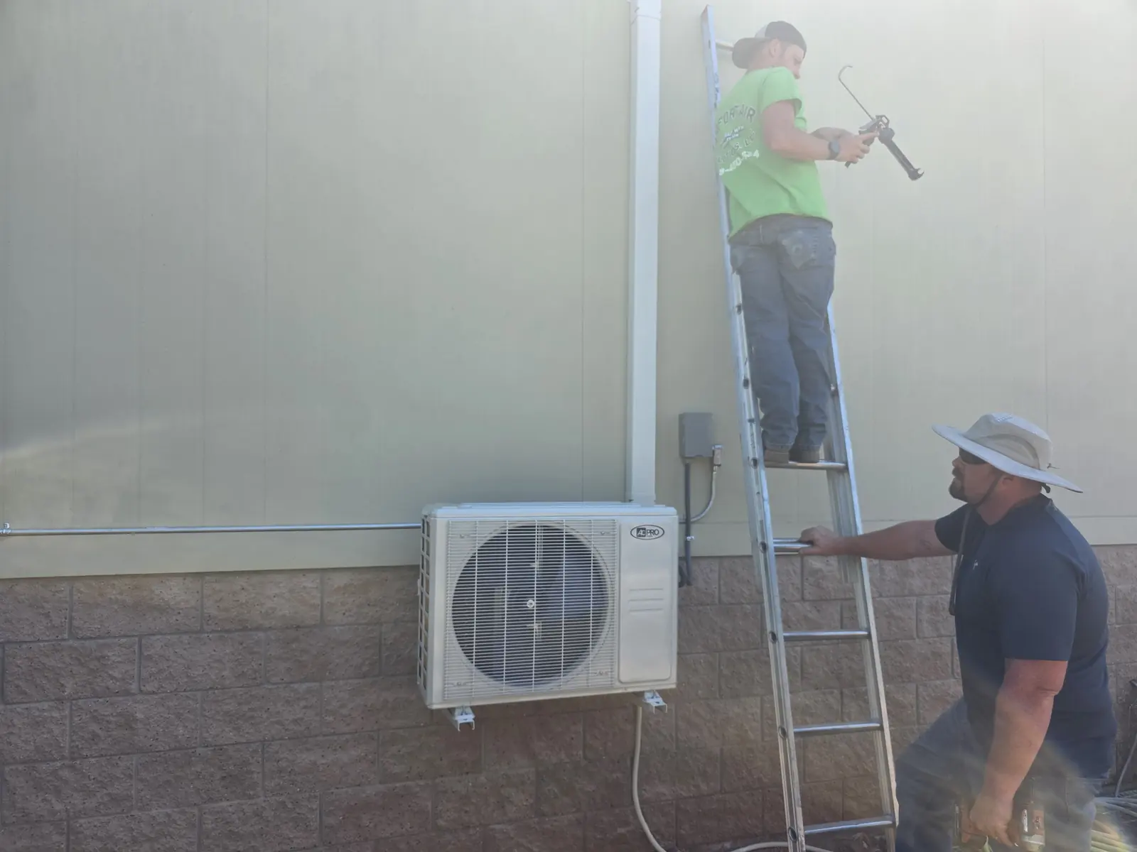Ductless mini-split head mounted on an interior wall
