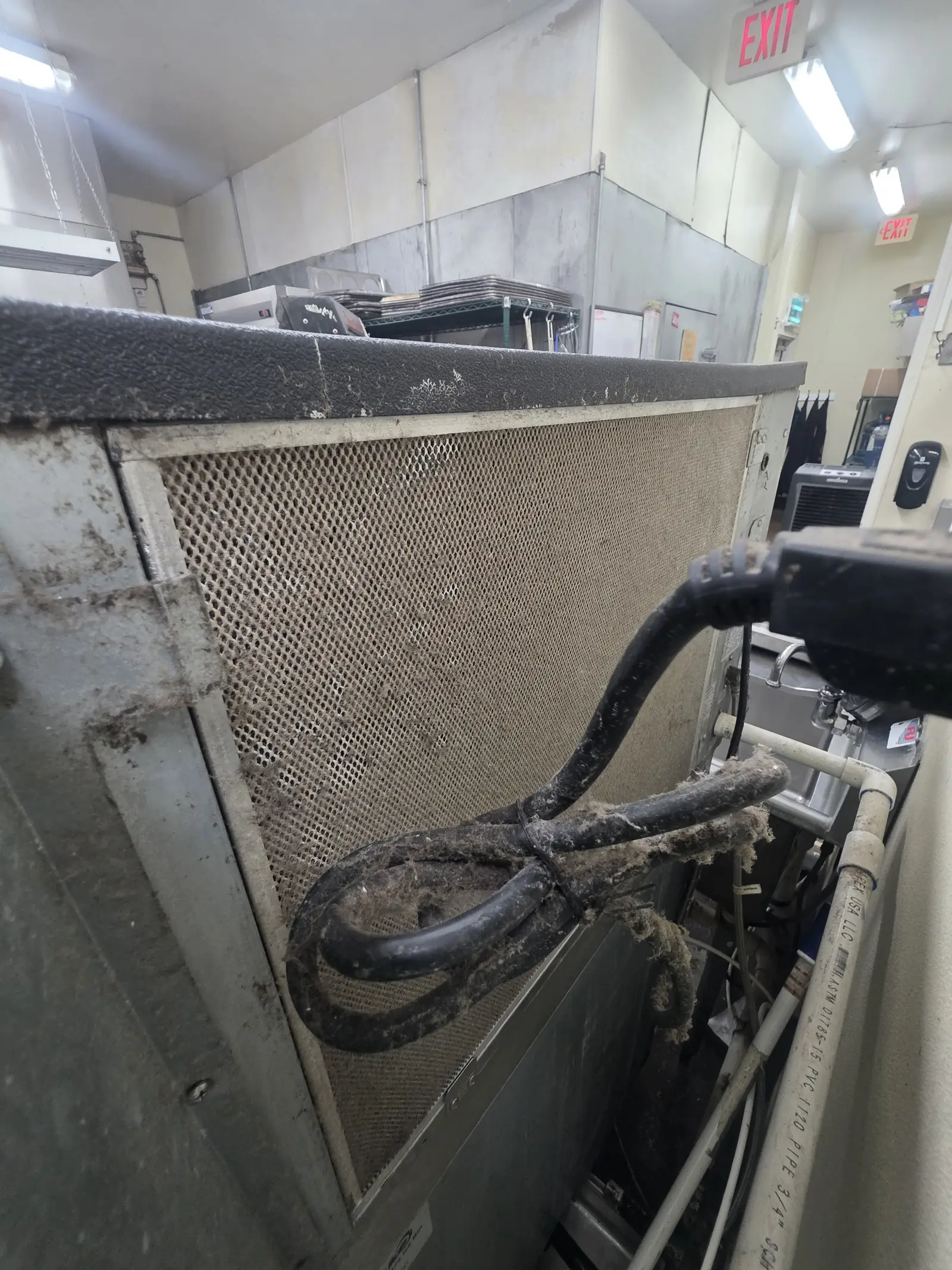 Dirty condenser coil on refrigeration equipment
