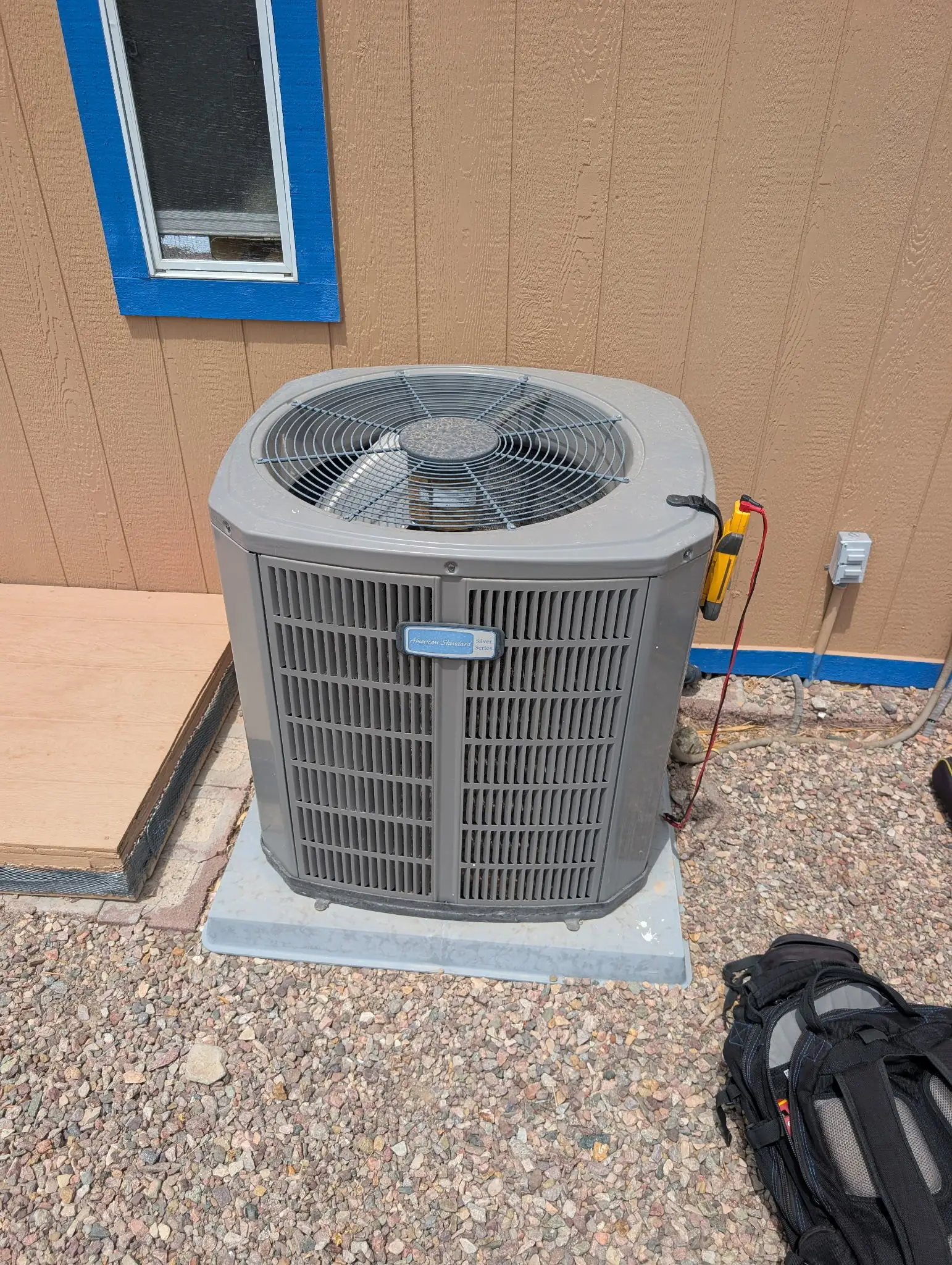 Outdoor air conditioning unit beside a Mohave County home