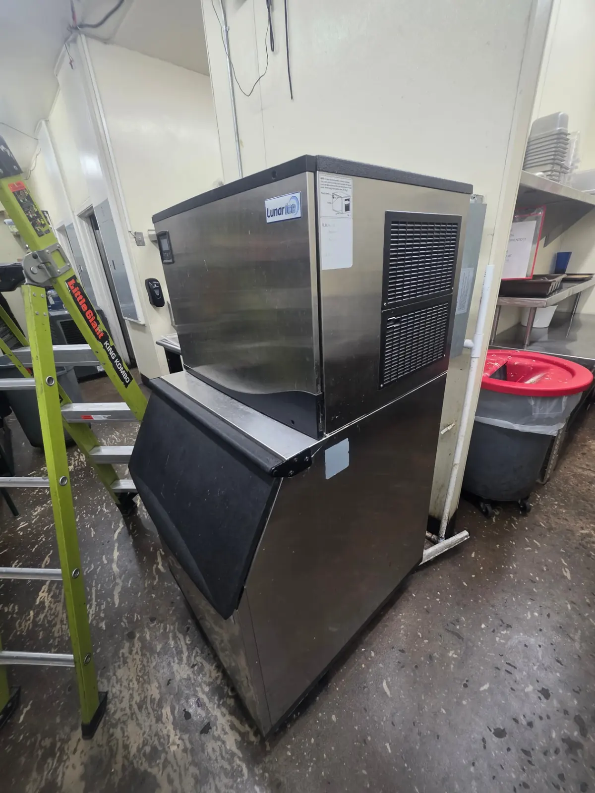 Commercial ice machine in a working kitchen